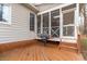Wooden deck with an outdoor grill, perfect for entertaining and enjoying the outdoors at 5309 Shoreline Ct, Holly Springs, NC 27540
