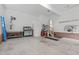 Spacious garage with brick accent, workspace, storage, and easy access to the home's interior at 5309 Shoreline Ct, Holly Springs, NC 27540