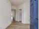 Inviting foyer with beautiful floors leading into the spacious home at 542 Winding Crk Dr, Lillington, NC 27546