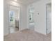 Bright hallway with access to bathroom and bedroom at 542 Winding Crk Dr, Lillington, NC 27546