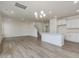 Spacious living room with hardwood floors, recessed lighting, and an open floor plan at 542 Winding Crk Dr, Lillington, NC 27546