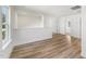 Open loft area featuring hard surface floors and ample natural light at 542 Winding Crk Dr, Lillington, NC 27546