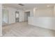 Second story loft area featuring neutral colored carpet, bright lighting, and multiple doorways at 542 Winding Crk Dr, Lillington, NC 27546
