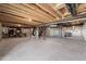 Spacious unfinished basement with exposed ceiling, beams and utilities and concrete floor at 612 Jasmine St, Wendell, NC 27591