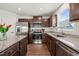 Well-equipped kitchen with stainless steel appliances and stylish cabinets at 612 Jasmine St, Wendell, NC 27591