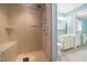 Modern bathroom featuring a glass-enclosed shower, vanity with sink, and tile flooring at 826 Warwick Ct, Burlington, NC 27215