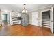 Spacious kitchen with stainless steel appliances, beautiful hardwood floors, and plenty of storage space at 826 Warwick Ct, Burlington, NC 27215