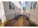 A narrow strip of backyard between two buildings, with AC units at 857 Athens Dr # 102, Raleigh, NC 27606