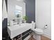 Modern half bathroom with sleek vessel sink and vanity at 857 Athens Dr # 102, Raleigh, NC 27606