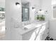 Bright bathroom with double sink vanity, modern fixtures, and stylish decor at 857 Athens Dr # 102, Raleigh, NC 27606
