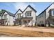 Charming two-story home with craftsman style details and covered front porch at 857 Athens Dr # 102, Raleigh, NC 27606