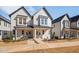 Charming two-story home with craftsman style details and covered front porch at 857 Athens Dr # 102, Raleigh, NC 27606