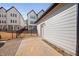 Detached one-car garage with modern architecture and concrete driveway at 857 Athens Dr # 102, Raleigh, NC 27606