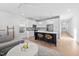 Bright open-concept kitchen with white cabinetry, stainless steel appliances, and modern island with breakfast bar at 857 Athens Dr # 102, Raleigh, NC 27606