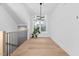 Bright loft area with hardwood floors and window overlooking the neighborhood at 857 Athens Dr # 102, Raleigh, NC 27606