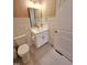 Well-lit bathroom features modern fixtures, vanity, and a tiled floor at 98102 Drummond, Chapel Hill, NC 27517