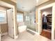 Bathroom featuring walk-in shower, soaking tub, and tile floors at 98102 Drummond, Chapel Hill, NC 27517