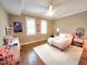 Bright bedroom with hardwood floors, two windows, and a ceiling fan at 98102 Drummond, Chapel Hill, NC 27517