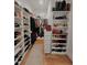 Large walk-in closet with extensive shelving at 98102 Drummond, Chapel Hill, NC 27517