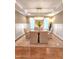 Elegant dining room with decorative rug, modern chandelier, and lots of natural light at 98102 Drummond, Chapel Hill, NC 27517