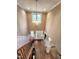 Grand two-story foyer with hardwood floors, elegant chandelier, and lots of natural light at 98102 Drummond, Chapel Hill, NC 27517