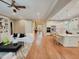 Bright open-concept living room flows into the kitchen featuring hardwood floors and stylish decor at 98102 Drummond, Chapel Hill, NC 27517