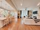 Open-concept kitchen and living room with hardwood floors and modern decor at 98102 Drummond, Chapel Hill, NC 27517