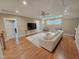 Open living area with hardwood floors, recessed lighting, and comfortable modern furnishings at 98102 Drummond, Chapel Hill, NC 27517