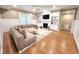 Cozy living room boasts a fireplace, built-in shelves, and comfortable sectional sofa at 98102 Drummond, Chapel Hill, NC 27517