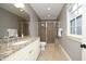 Bathroom showcasing granite countertop vanity and glass-enclosed shower at 1017 Payton Ct, Raleigh, NC 27614