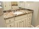 Bathroom vanity with custom wood drawers and striking granite countertops at 1017 Payton Ct, Raleigh, NC 27614