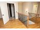 Hallway featuring access to residential elevator and staircase at 1017 Payton Ct, Raleigh, NC 27614