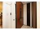 Residential elevator with wood paneling and folding gate at 1017 Payton Ct, Raleigh, NC 27614
