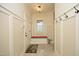 Welcoming entryway features a built-in bench, coat hooks, and a decorative rug at 1017 Payton Ct, Raleigh, NC 27614