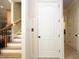 Entryway with staircase and door to an elevator at 1017 Payton Ct, Raleigh, NC 27614