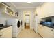 Bright laundry room featuring modern washer and dryer at 1017 Payton Ct, Raleigh, NC 27614
