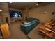 Home media room with plush seating, a large screen, and cozy atmosphere at 1017 Payton Ct, Raleigh, NC 27614