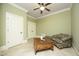 The sitting room is bright with earth-toned accents and a wood coffee table at 1017 Payton Ct, Raleigh, NC 27614