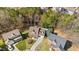 Spacious home with inviting curb appeal, lush lawn, and a sparkling in-ground pool in a desirable neighborhood at 104 Spooner Ct, Holly Springs, NC 27540