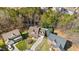 Spacious home with inviting curb appeal, lush lawn, and a sparkling in-ground pool in a desirable neighborhood at 104 Spooner Ct, Holly Springs, NC 27540