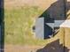 Overhead view of a home showcasing the roof, lawn and driveway, and a manicured landscape at 109 Perignon Dr, Princeton, NC 27569