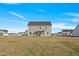 The backyard features a large yard and a patio area, perfect for enjoying the outdoors at 109 Perignon Dr, Princeton, NC 27569