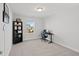Bedroom with neutral carpet, computer desk, and a window overlooking the neighborhood at 109 Perignon Dr, Princeton, NC 27569