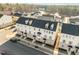 Overhead view of townhomes with well-kept landscaping, close to nature at 1414 Excelsior Grand Ave, Durham, NC 27713