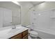 Bathroom featuring a single vanity and tub with shower at 1414 Excelsior Grand Ave, Durham, NC 27713