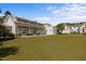 Bright and expansive white-clad building with a large lawn and a symmetrical design at 1414 Excelsior Grand Ave, Durham, NC 27713