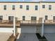 Townhome featuring a private garage, offering convenient parking and additional storage at 1414 Excelsior Grand Ave, Durham, NC 27713