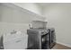 The laundry room includes the sink and washer and dryer at 1414 Excelsior Grand Ave, Durham, NC 27713