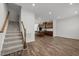 Open-concept living space that leads to a modern kitchen with an island at 1414 Excelsior Grand Ave, Durham, NC 27713