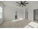 Spacious main bedroom featuring a ceiling fan and an en-suite bathroom at 1414 Excelsior Grand Ave, Durham, NC 27713